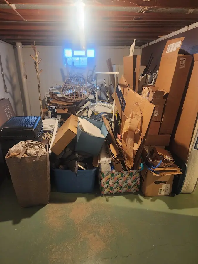 Roll-off dumpster container at job site for Cleanout Dumpster Rental in Webster